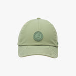 Light green baseball cap with a logo on a white background
