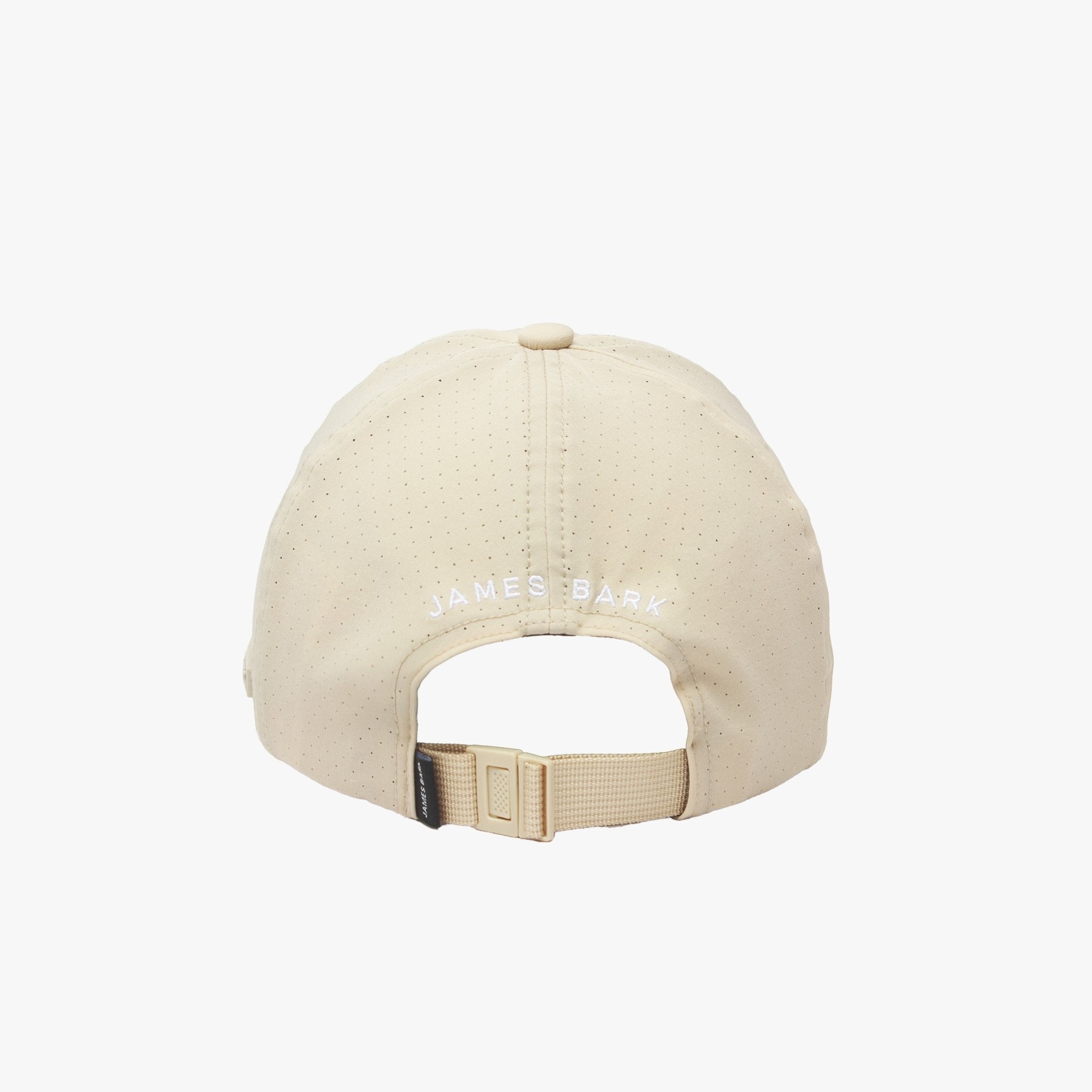 Rear view of the beige cap displaying "JAMES BARK" text in white