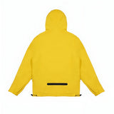 Back view of a yellow James Bark jacket with a hood. The design features a sleek, minimalistic look, with a single black zipper pocket near the bottom and adjustable drawstrings at the hem for a tailored fit. The jacket has a streamlined appearance with no visible seams or additional detailing on the back.