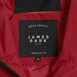 Detail of the adjustable hood drawstring on the red jacket.