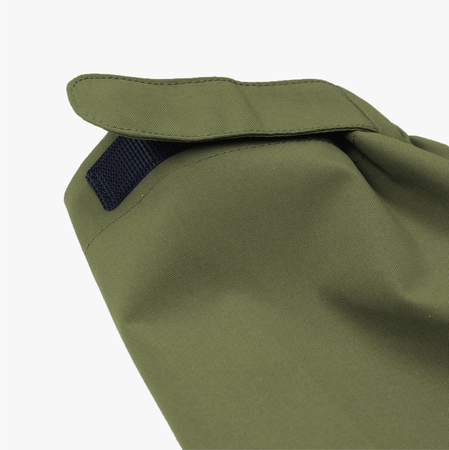 Adjustable hood drawstring detail on the green jacket.