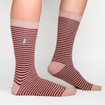 Pair of Tuscany socks with red stripes, featuring an embroidered logo on the side.