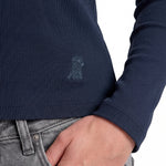 Navy blue sweater with a logo on a white background