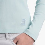 Light blue sweater with a small embroidered logo on a plain background