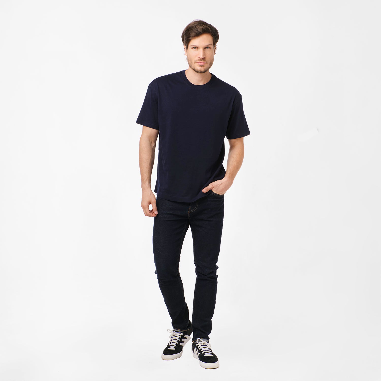 The navy blue t-shirt laid flat from a different angle to emphasize the fabric and color.