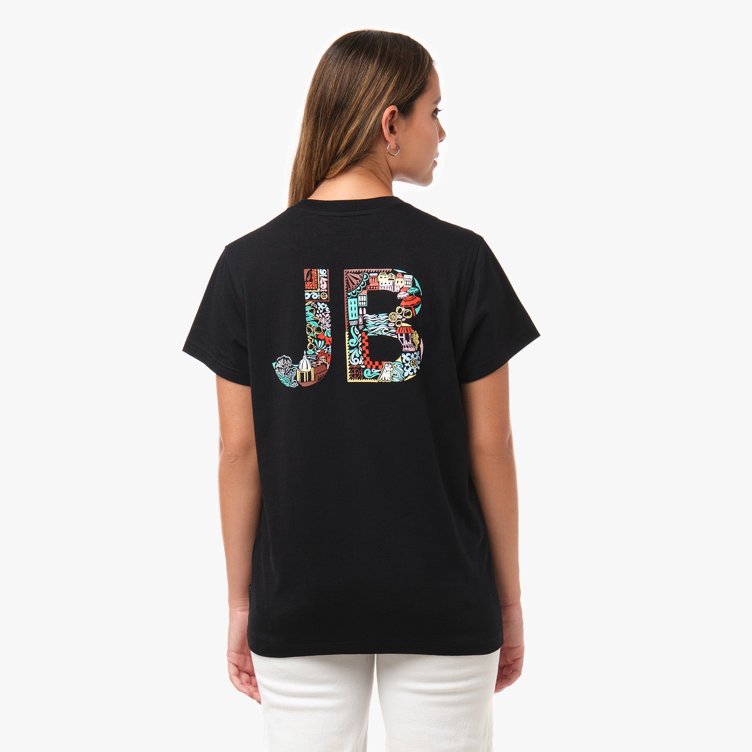 Rear view of a black t-shirt with a large "JB" graphic filled with a colorful, intricate pattern.