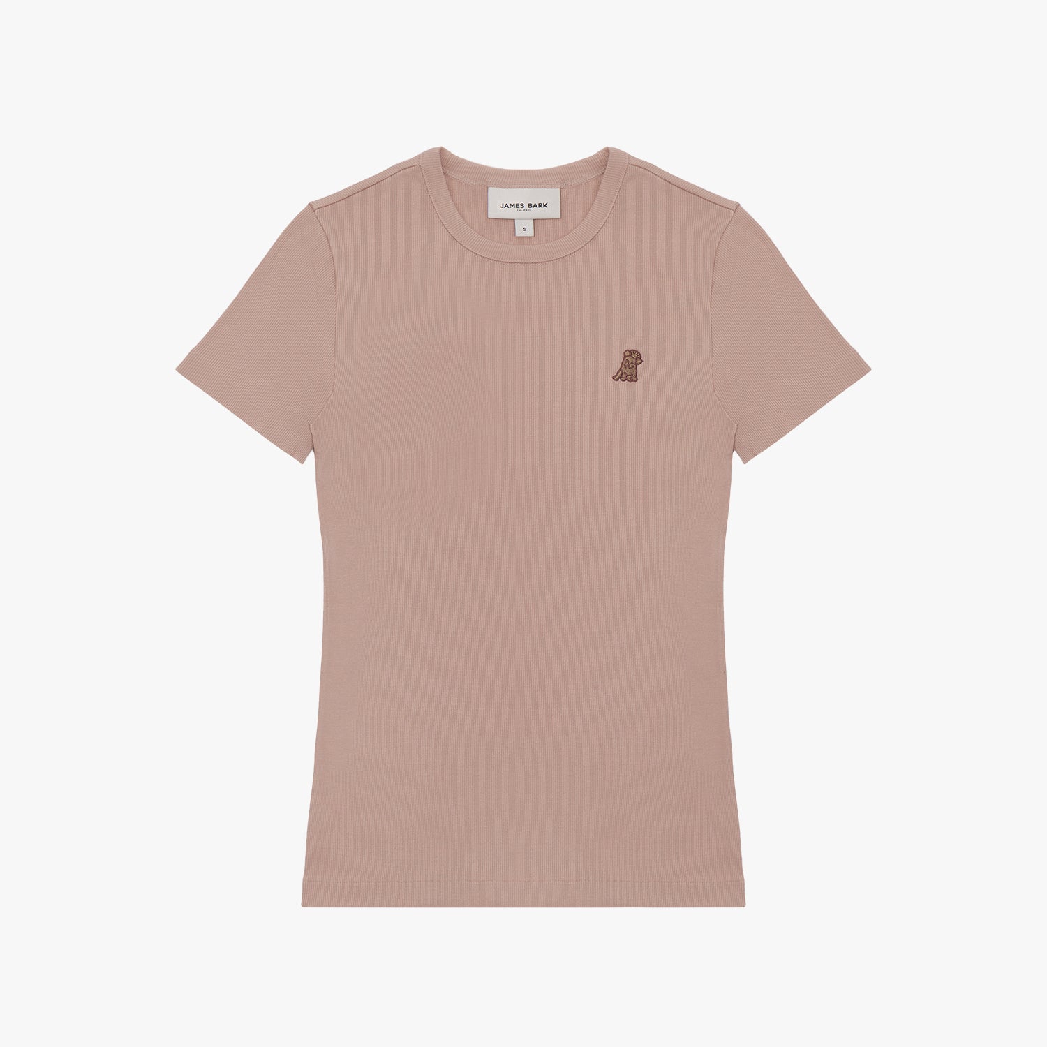 A dusty rose-colored short-sleeve T-shirt laid flat on a white background. It features a ribbed crewneck collar and a fitted silhouette. A small embroidered logo of a dog in a darker brown shade is positioned on the left chest area. The neckline includes a white label with black text displaying the brand "JAMES BARK." The fabric appears to be soft and lightweight.