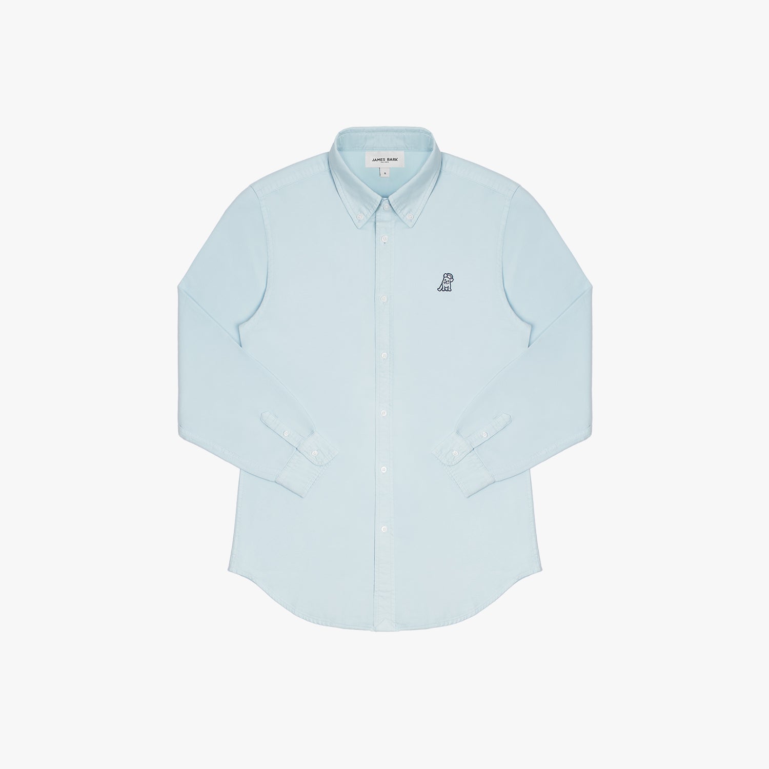 Front view of a light blue long-sleeved button-down shirt laid flat against a white background. It features a button-down collar, white buttons, buttoned cuffs, and a tonal blue embroidered dog logo on the left chest