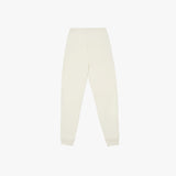 Back view of off-white jogger pants featuring a single back pocket and cuffed ankles.