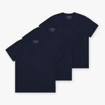 Three navy blue T-shirts stacked diagonally, showing the front of each shirt. No visible design on the front, showcasing a simple, minimalist style.