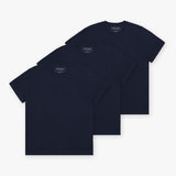 Three navy blue T-shirts stacked diagonally, showing the front of each shirt. No visible design on the front, showcasing a simple, minimalist style.