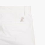 Another close-up of the back pocket on the white pants, showing the pocket detail and logo embroidery.