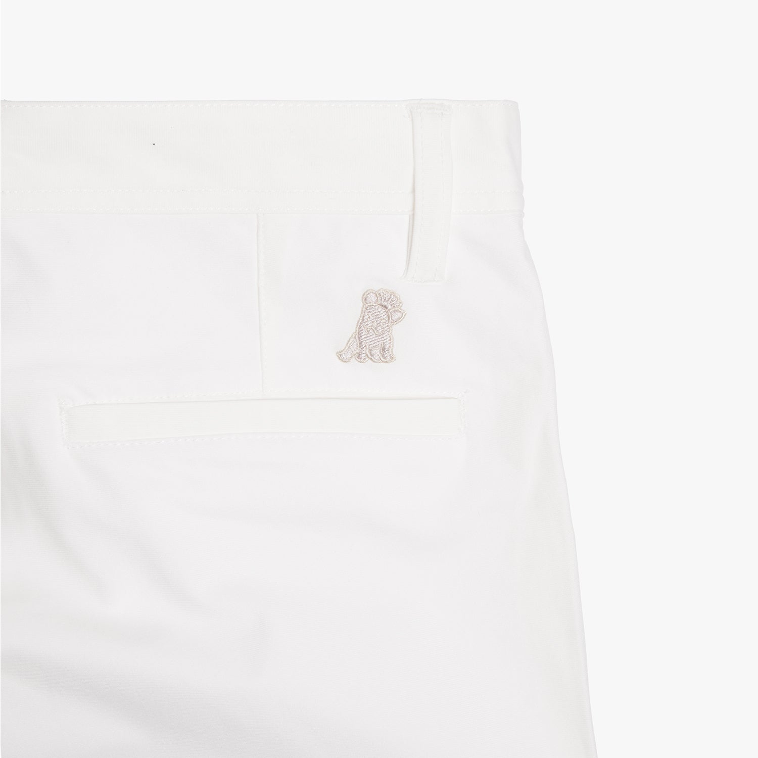 Another close-up of the back pocket on the white pants, showing the pocket detail and logo embroidery.