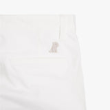 Another close-up of the back pocket on the white pants, showing the pocket detail and logo embroidery.