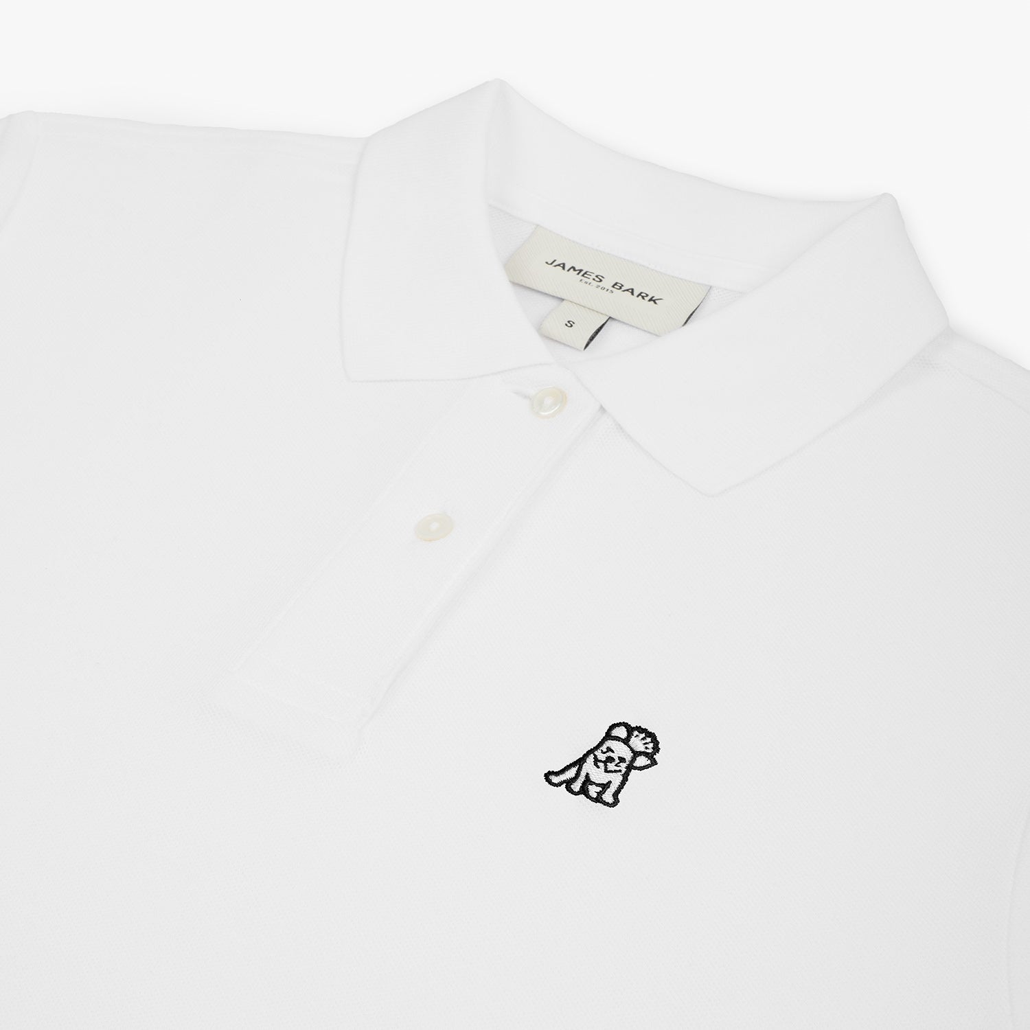 Flat-lay front view of the white polo shirt, showcasing the button collar and logo.