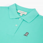 Flat-lay front view of the light turquoise polo shirt showcasing the button collar and embroidered logo.