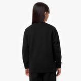 Back view of a child wearing the black sweatshirt, showcasing its minimalist design