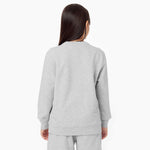 Back view of a child wearing the gray sweatshirt, showcasing its simple and minimalist design