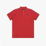 Red polo shirt laid flat, showing collar, buttons, brand tag, and blue embroidered dog logo