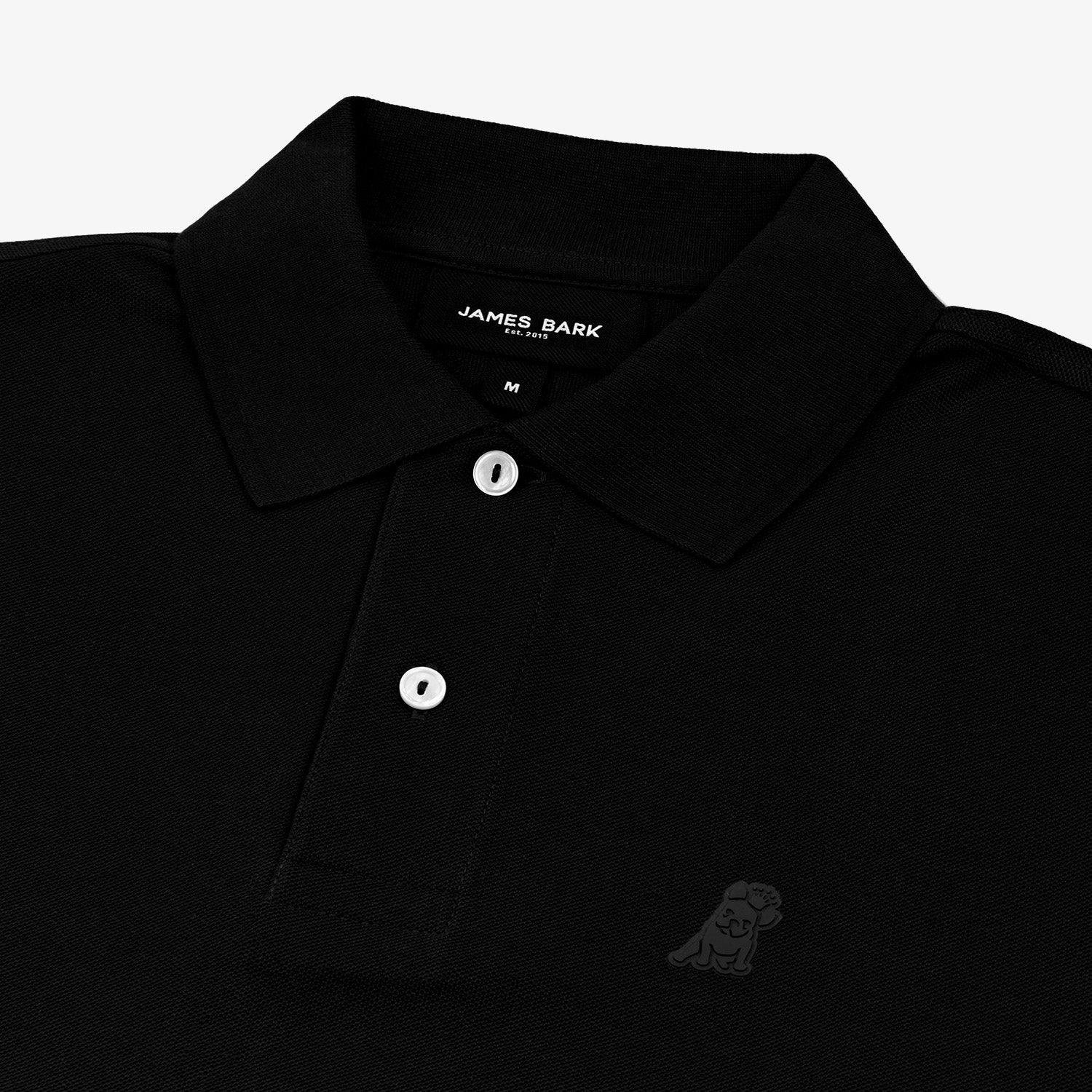  Polo shirt displayed flat on a white surface, showing the entire front of the shirt with the embroidered logo on the chest.
