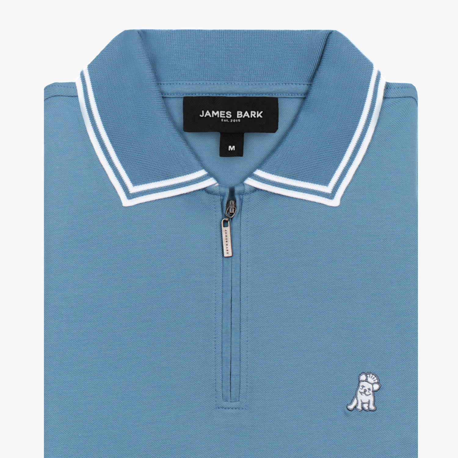 Flat lay of a light blue polo shirt with white trim on the collar and sleeves.