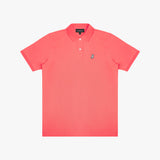 Coral polo shirt with a small logo on a light gray background