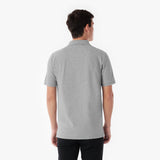 Back picture of a man wearing a gray polo shirt on a white background