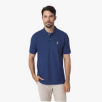 Man wearing a blue polo shirt on a white background