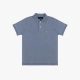 A dusty blue polo shirt with a three-button placket and a small embroidered dog logo on the left chest, displayed flat against a light gray background.