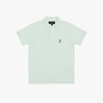 A light mint green polo shirt for kids, featuring a small embroidered logo on the left chest and a black brand label on the collar
