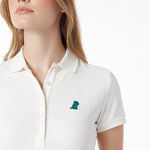 Close-up of a white polo shirt with a small logo on a white background