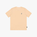 A light peach T-shirt with a small embroidered logo on the left chest, displayed flat against a white background.