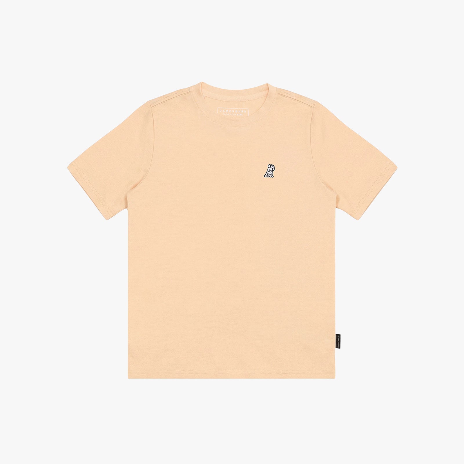 A light peach T-shirt with a small embroidered logo on the left chest, displayed flat against a white background.