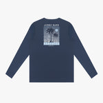 Back view of a navy blue rashguard with palm tree design and text on a white background