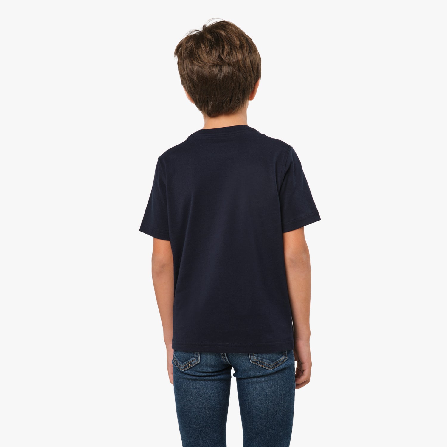 Rear view of the boy wearing the navy blue T-shirt, showing the plain back design, paired with jeans.