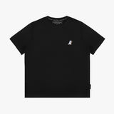 Flat lay of the front of the black T-shirt with the small decorative 'JB' logo on the chest.