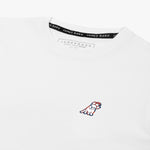 Close-up of the neckline of the white T-shirt, showing the label and detailed stitching.