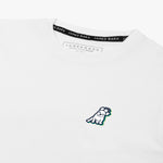 Close-up of the neckline and small dog graphic on the chest of a white T-shirt.