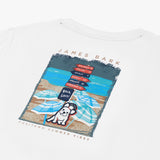 Close-up of the back of the white t-shirt showing the beach-themed graphic with a dog and stacked items.