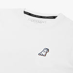 Close-up of the small embroidered logo on the front of the white t-shirt.