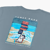 Close-up of the back of the gray t-shirt showing the beach-themed graphic with a dog and stacked items.