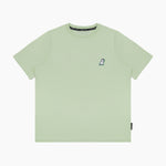 Close-up of the neckline and small dog graphic on the chest of the light green T-shirt.
