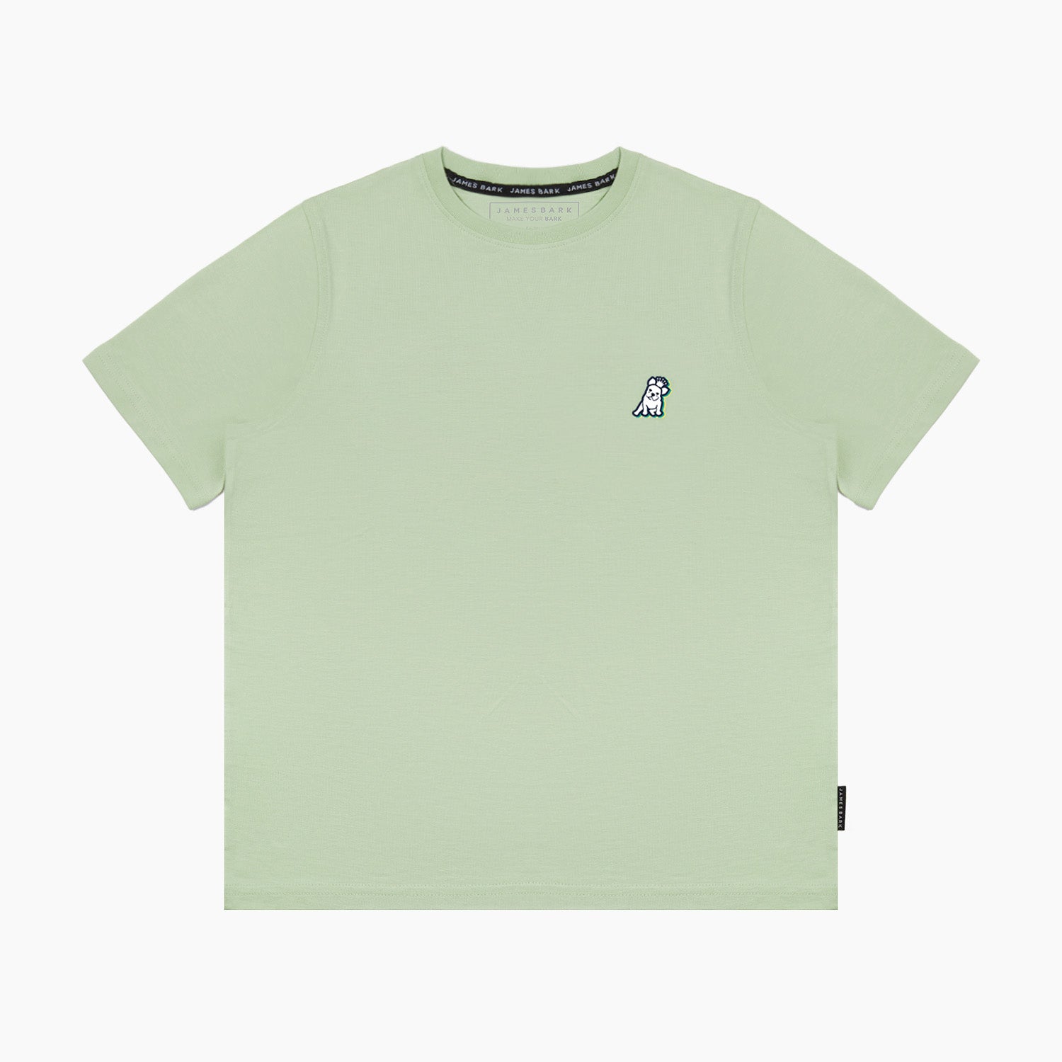 Close-up of the neckline and small dog graphic on the chest of the light green T-shirt.
