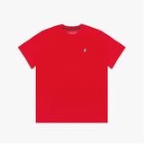 A red short-sleeved T-shirt with a small embroidered white dog logo on the upper left chest area. The neckline has a black inner lining with repeated 'JAMES BARK' branding, and the inside label displays the brand name.