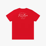 A red short-sleeved T-shirt displayed from the back, featuring white printed text that reads 'PRIVÉ SOCIETY' at the top, followed by 'James Bark' in a script font, 'make your bark' underneath, and 'BASED IN USA EST. 2015' at the bottom