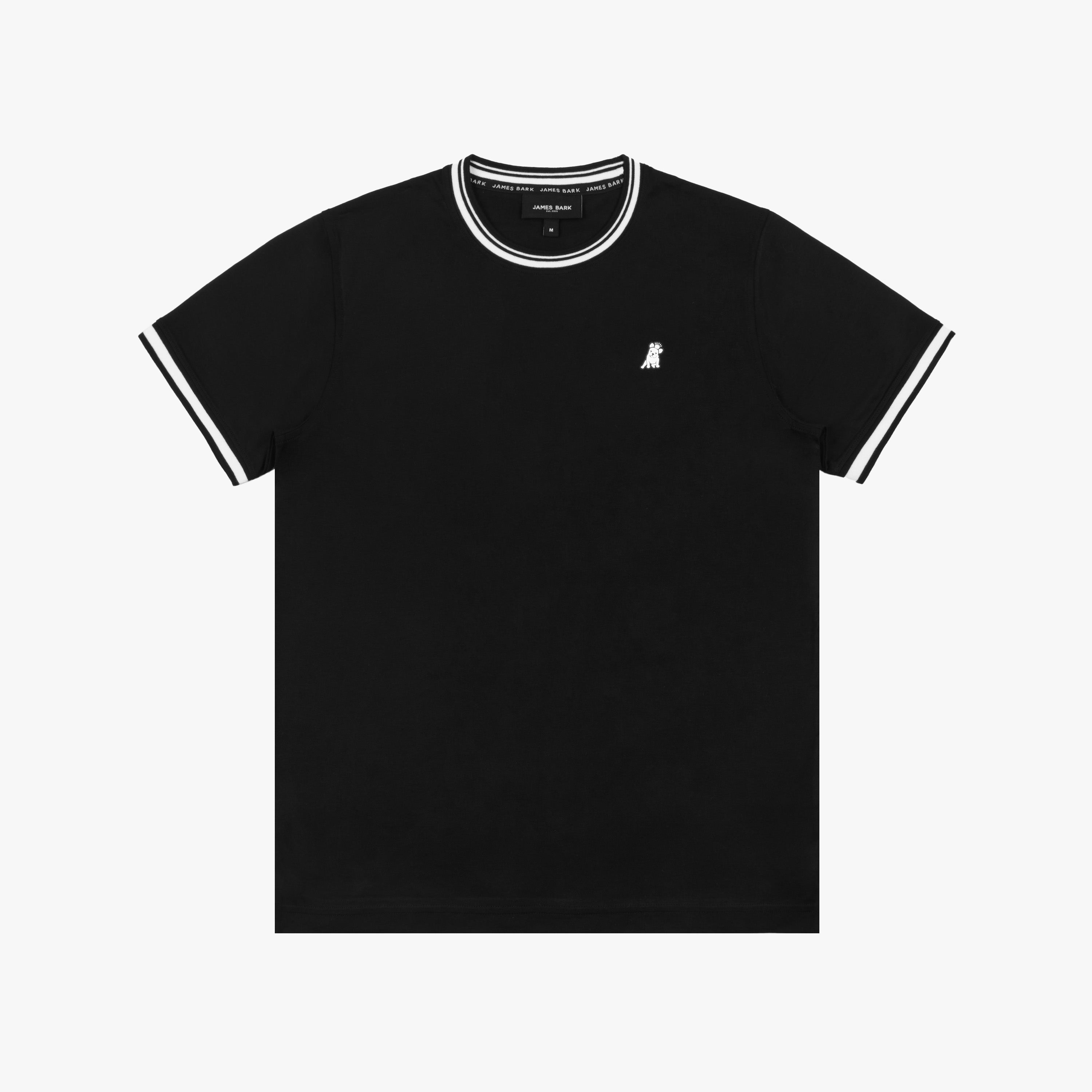 Flat lay of the black T-shirt with white trim, showing the small dog graphic on the chest.