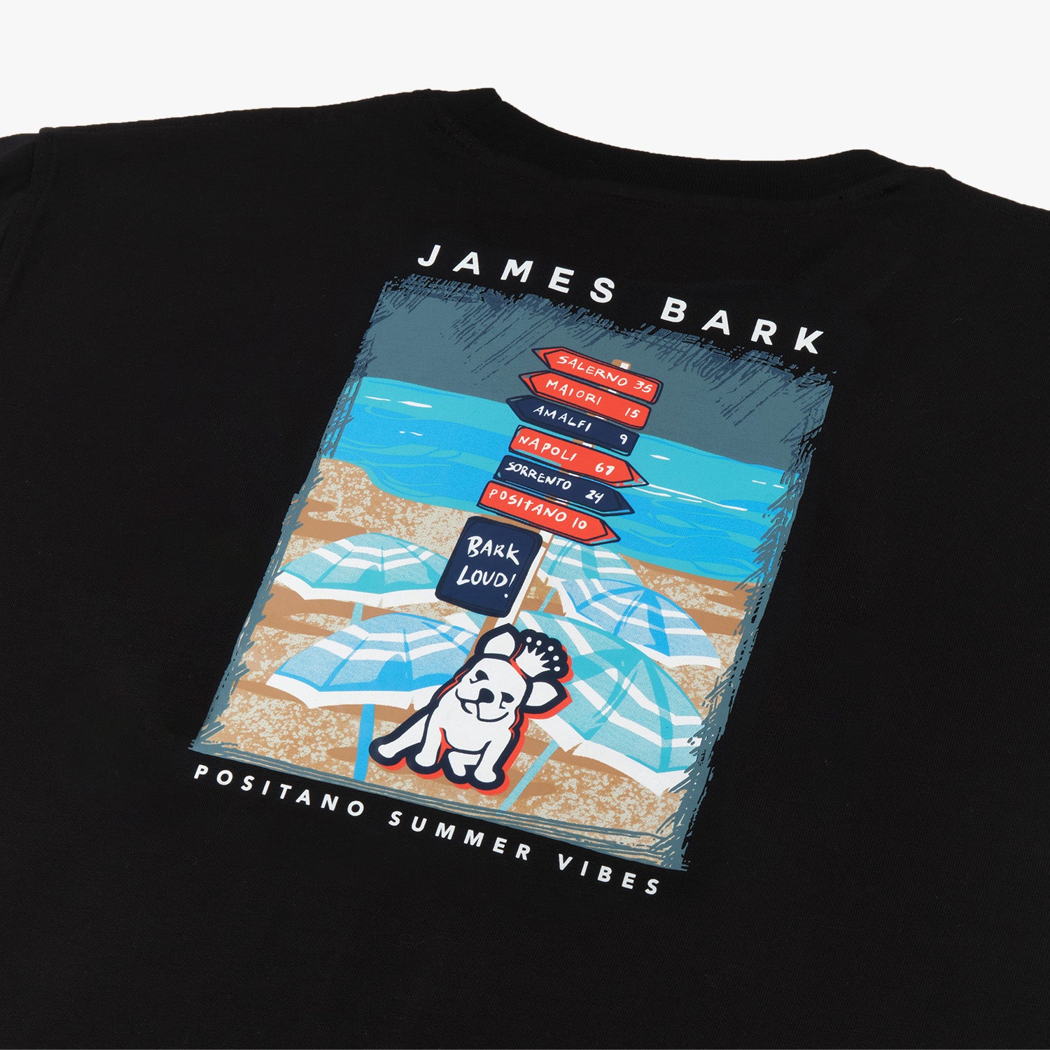 Back view of a black t-shirt with beach graphic laid flat: The t-shirt is displayed with the beach-themed design, including surfboards, a dog, and "JAMES BARK" branding.
