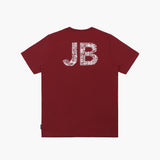 Back view of a maroon t-shirt featuring a large, decorative 'JB' logo across the upper back. The logo is designed with intricate, white, doodle-like details within the letters, adding a creative and bold element to the shirt's design.