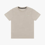 A beige short-sleeved T-shirt featuring a subtle tonal logo patch on the upper left chest area that reads 'JAMES BARK.' The neckline includes a black inner lining with repeated 'JAMES BARK' branding, and the inside label also displays the brand name