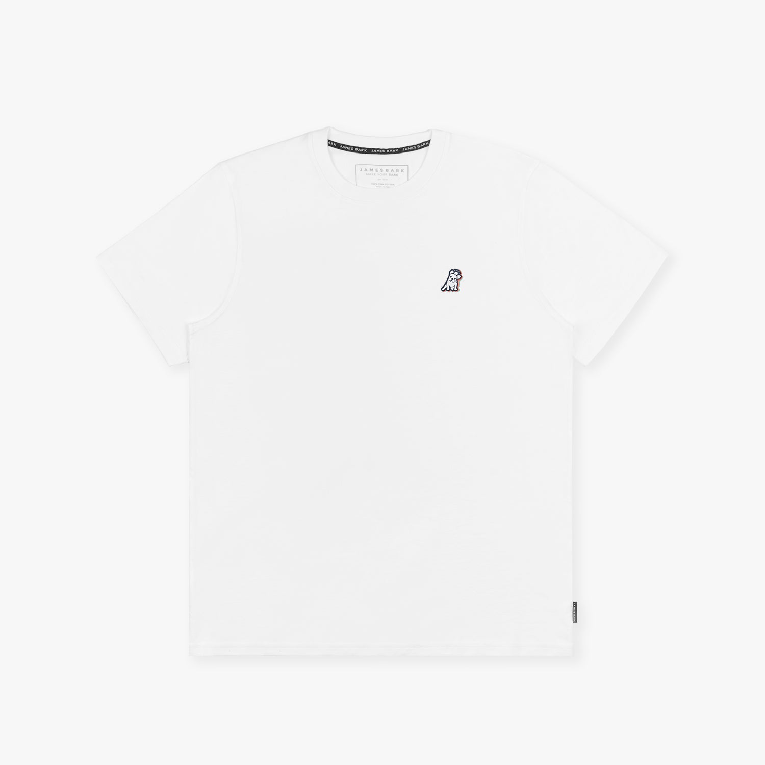 White t-shirt with a small embroidered French bulldog logo on the left chest. The t-shirt has a clean and simple design with a subtle 'James Bark' branding tag at the bottom left hem. The inner collar features the brand label with 'James Bark,' 'Make Your Bark,' and 'Est. 2015' text.